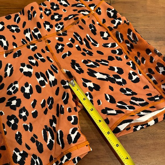 Fabletics On-The-Go PowerHold® High-Waisted Short in Orange Leopard Print - Picture 3 of 5